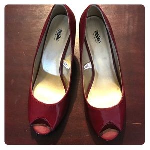 Good condition patent red heels