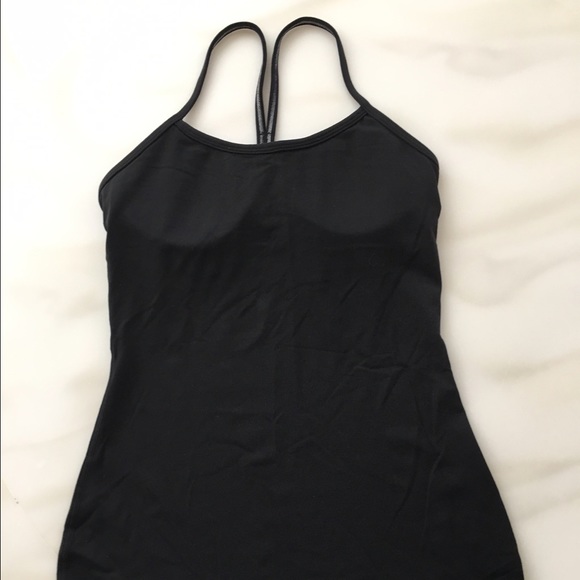 Lululemon Athletica Tops - Lululemon Athletica black top size 4 NEW