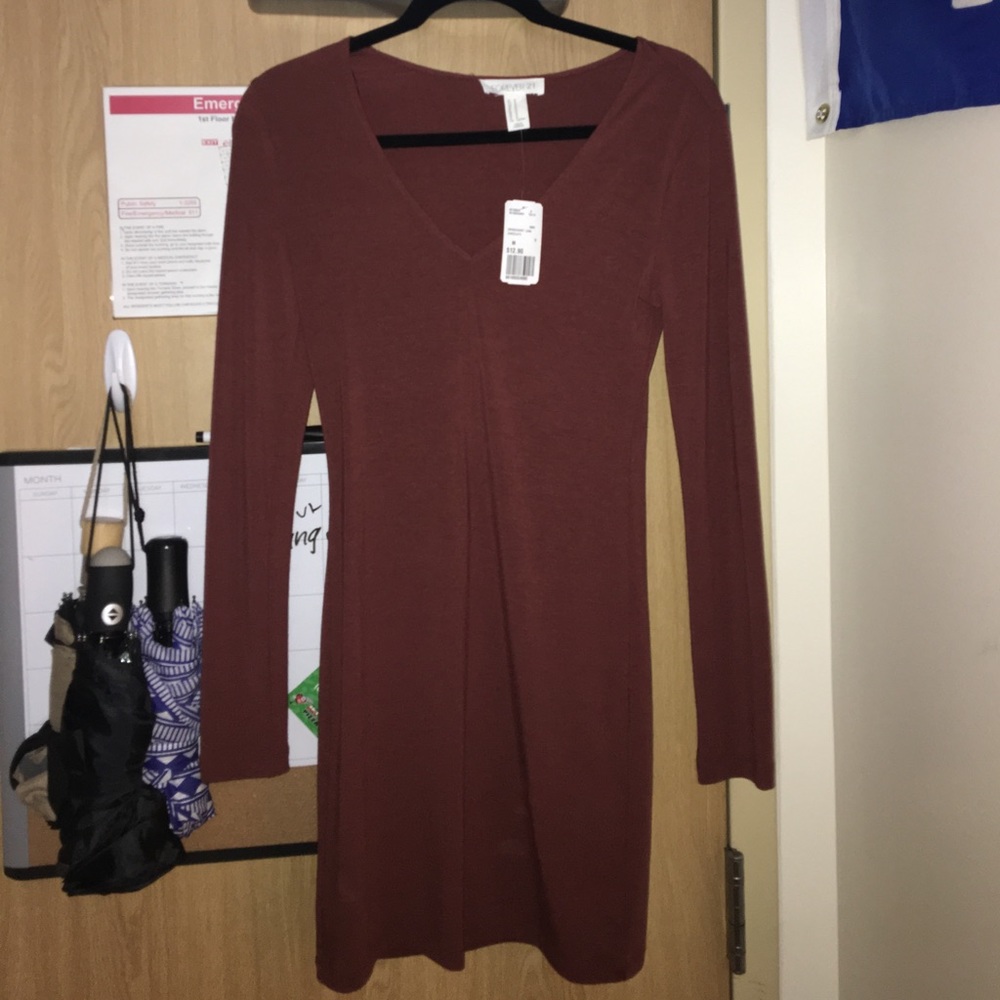 A brown/maroon tight cocktail dress