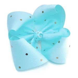 Pale aqua boutique bow with gold polkadots.