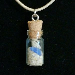 Beach in a bottle neckace. Shell and blue seaglass