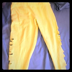 Hollister yellow legging with holes along the side