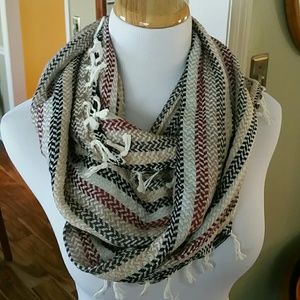 Woven fringed infinity scarf