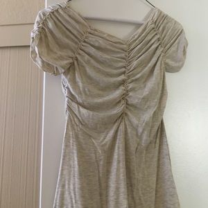 Woman's Md. tan shirt.