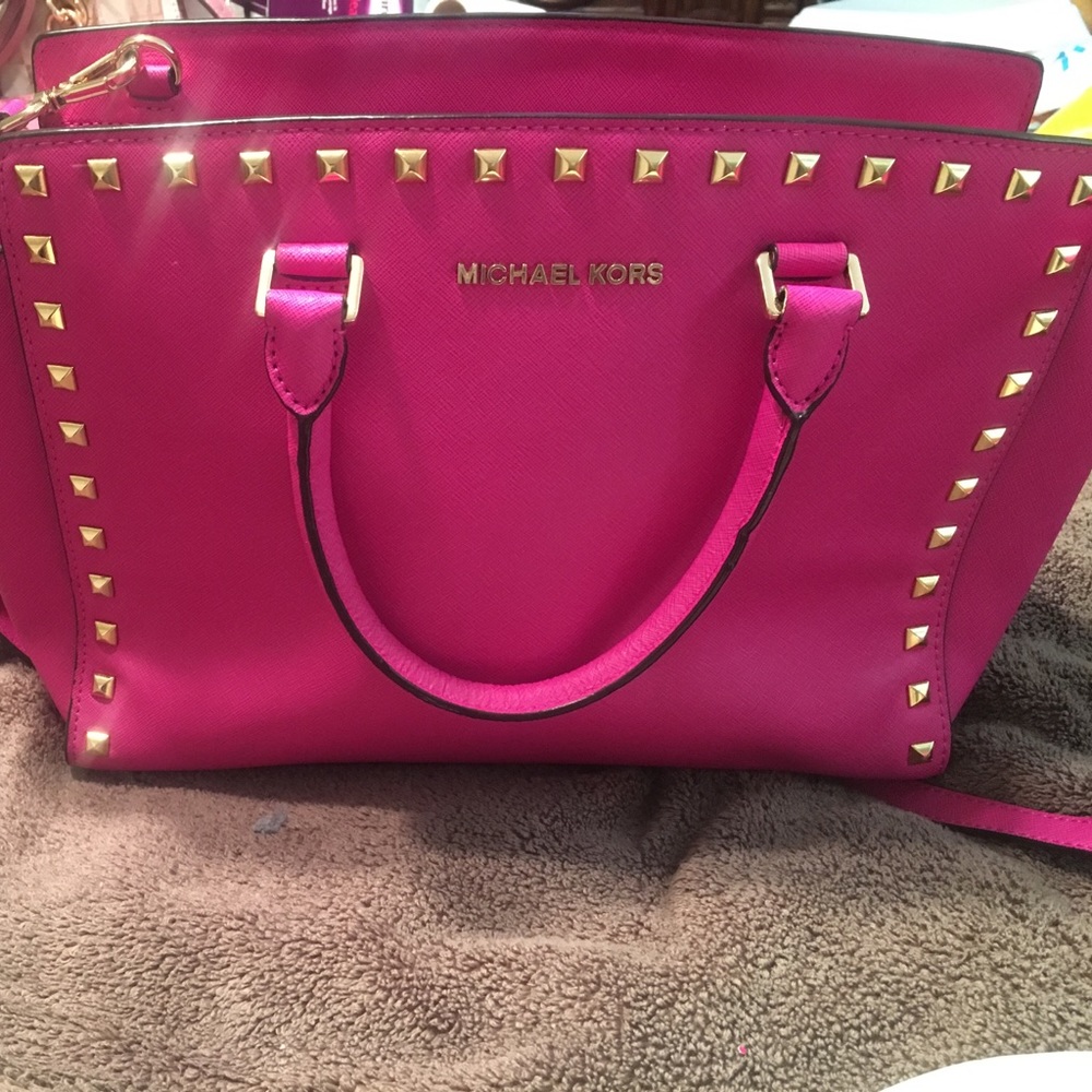 Michael Kors fuchsia leather studded Selma.