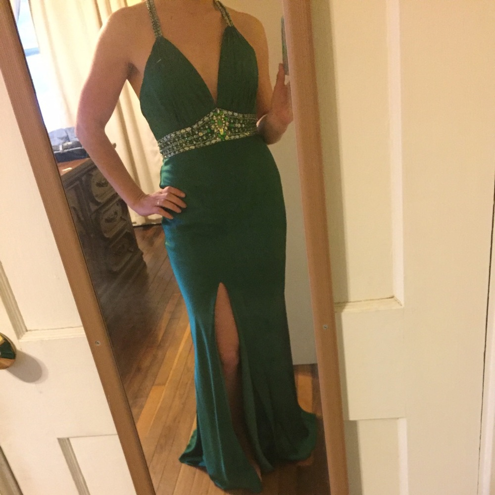 Green beaded prom dress with deep v neckline