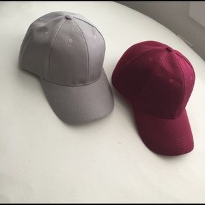 2 baseball caps. Tan & burgundy