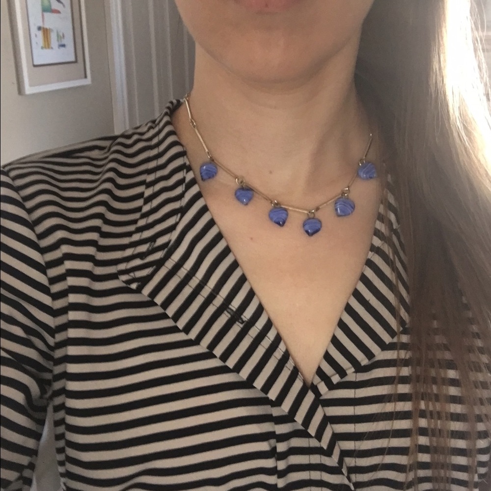 Gold necklace with blue charms