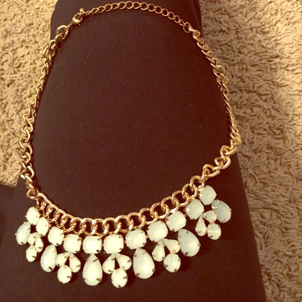 Gold chain blue stone necklace