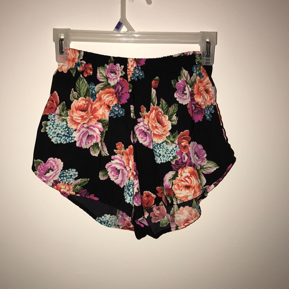 Black shorts with colorful floral patterns
