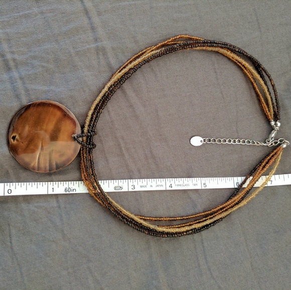 Amber colored pendent and beaded necklace - Picture 2 of 3