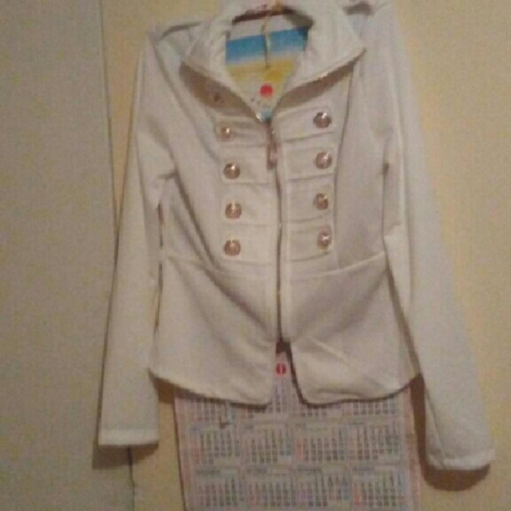 White zip up over jacket.