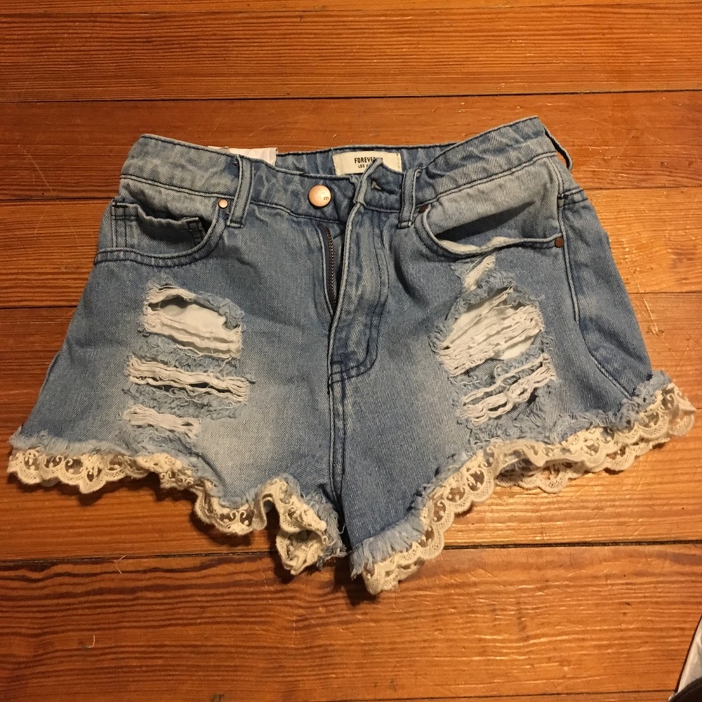 Destroyed high wasted lace trim denim shorts