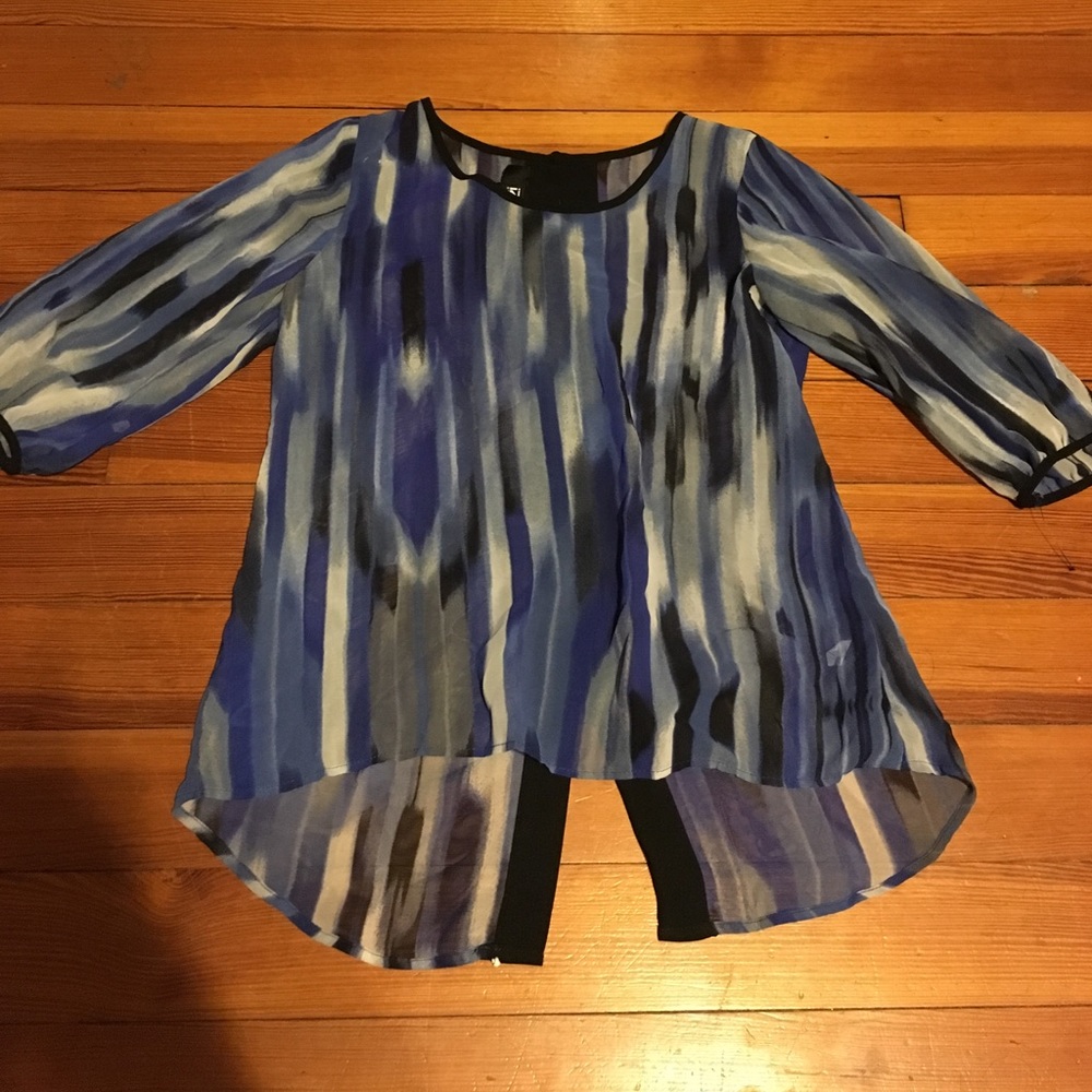 Blue, black, and white blouse