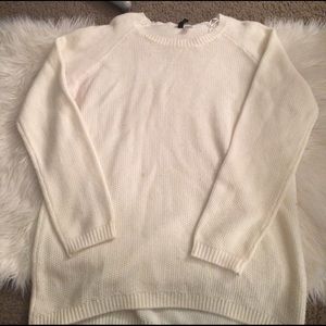 Off white knitted sweater.