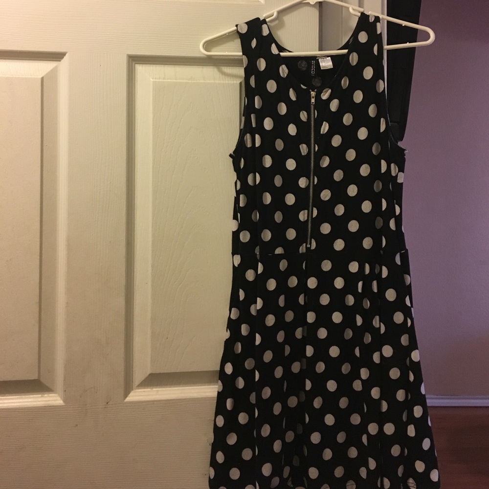 A Polkadotted white and black dress