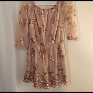 Off shoulder rose gold sequin romper