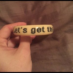 Bracelet with "let's get this party started!"