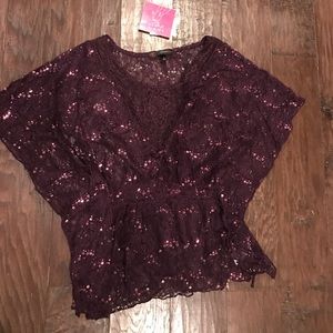 Purple PEPLUM shirt with sparkles. Size large. NWT