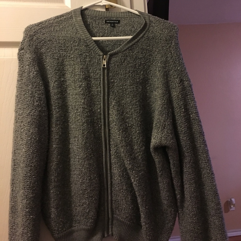 A gray knitted sweater