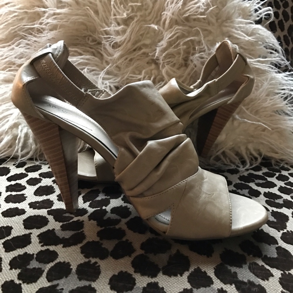 nude/tan peep toe heeled booties