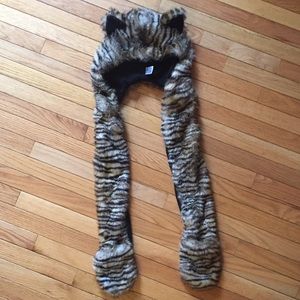 Faux fur hat with long tails for warm hands.