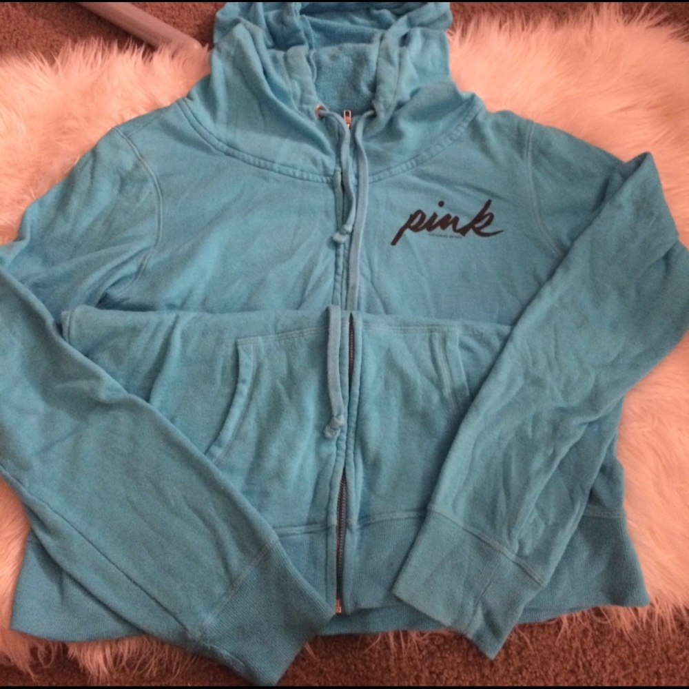 Light blue zip up hoodie.