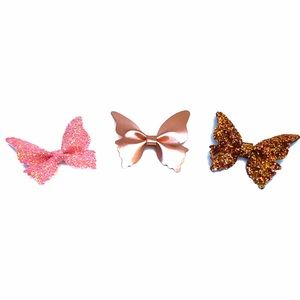 Set of three butterfly clips.