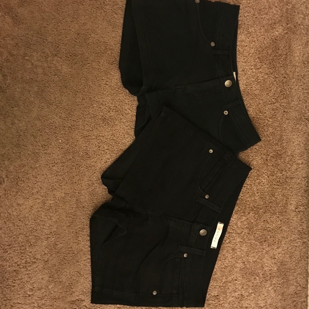 2 pairs of black shorts