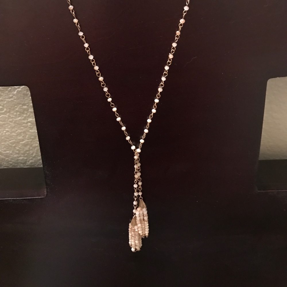 Gorgeous,long tassel necklace.Gold and light pink