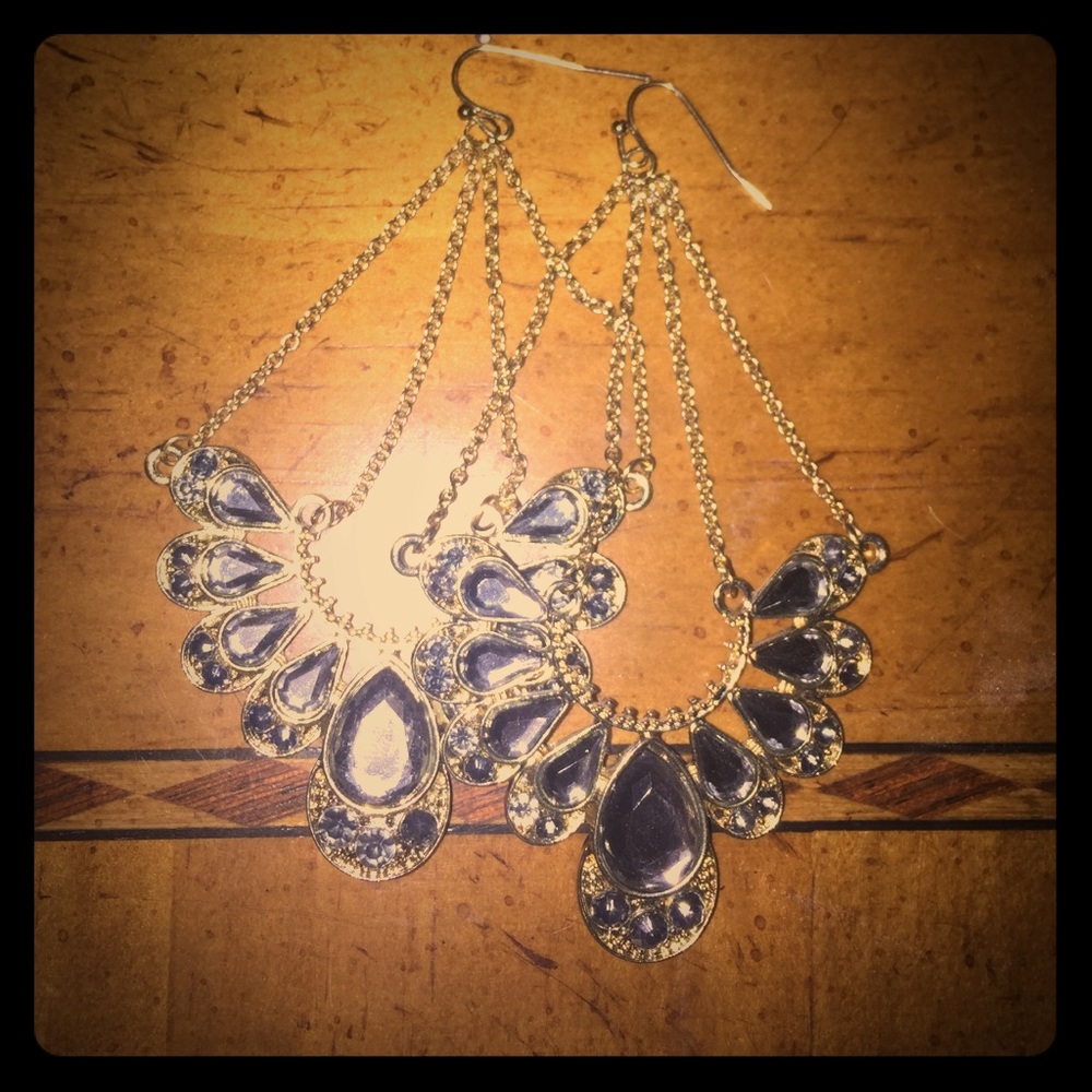 Gold tone and grey stone earrings