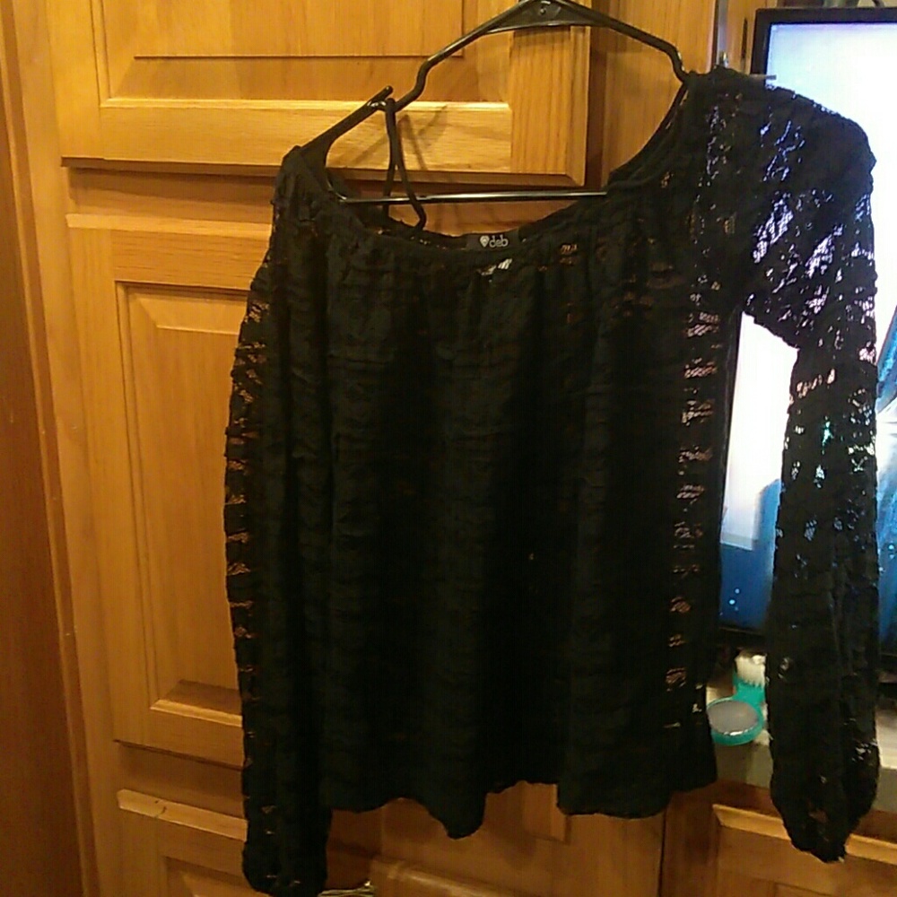 Black lace top.. New condition..