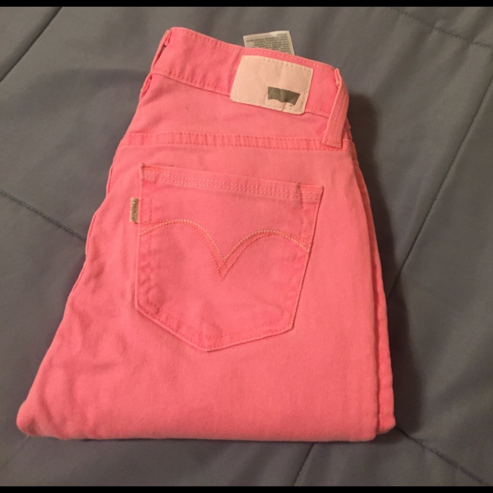 Bright pink Levi's jeans
