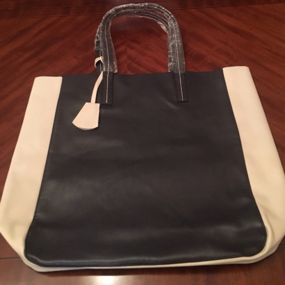 Navy and tan leather shopping tote