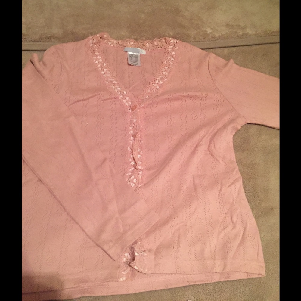 Cute button up blouse with lace.