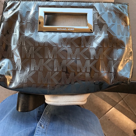 Michael Kors Handbags - Michael Kors Silver Clutch