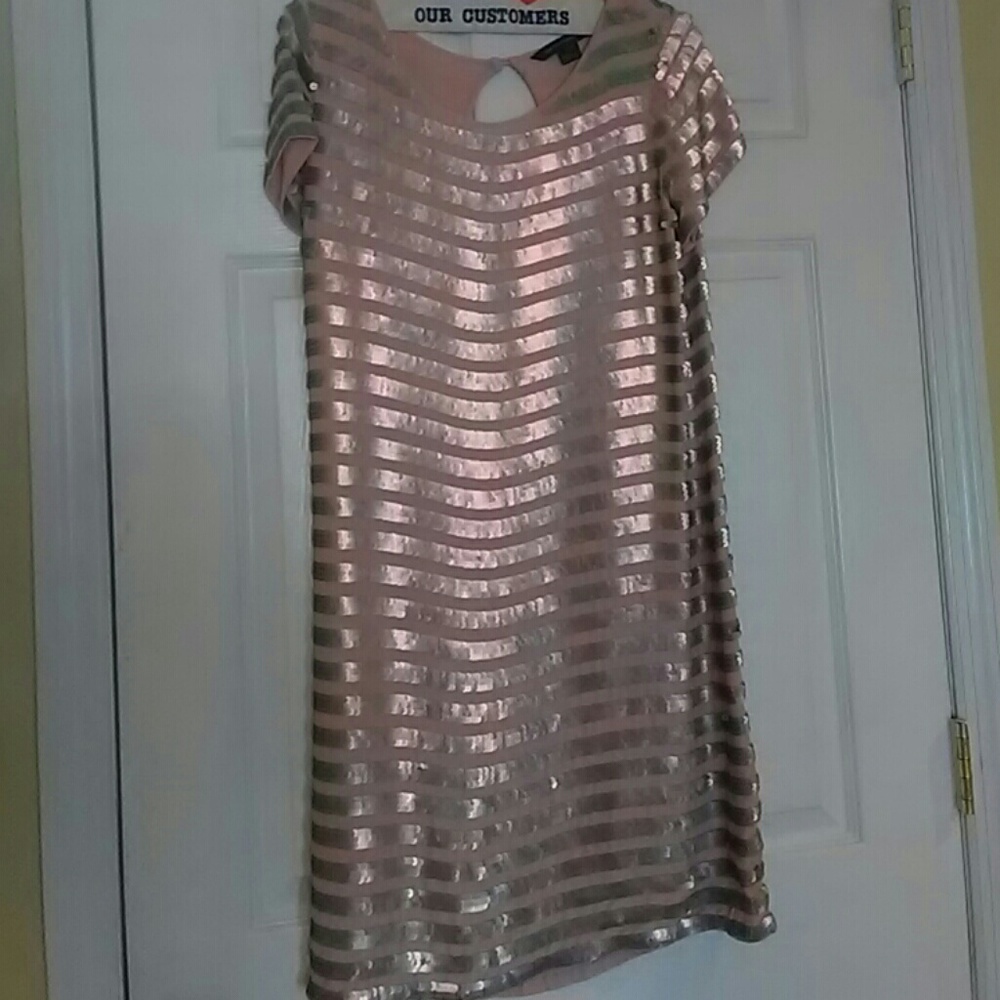 Dress worn 1 time. Its been hanging in my closet
