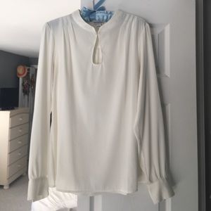 Cream colored Banana Republic blouse.