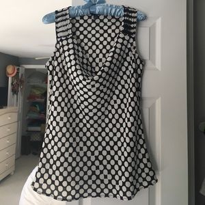 Black and white sleeveless blouse