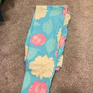 Lularoe OS leggings. Floral print with small stain