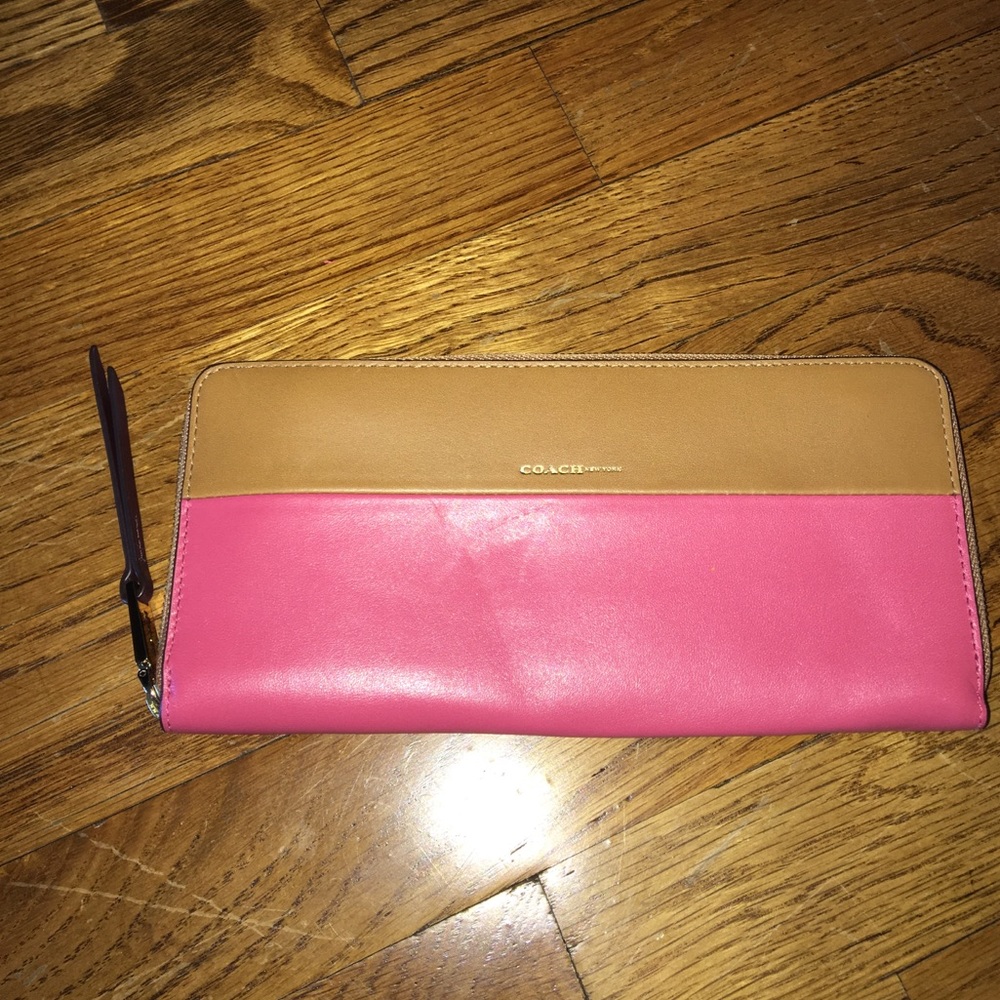 Pink and tan coach wallet