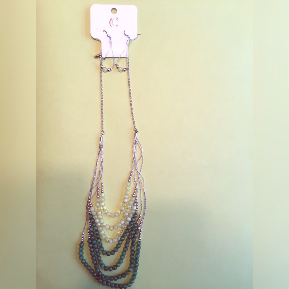 Matching Charming Charlie necklace and earrings