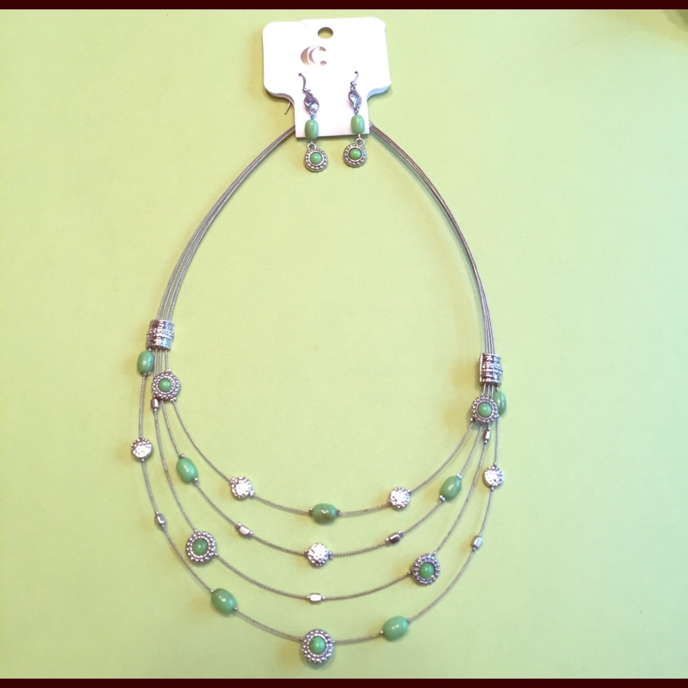 Matching Charming Charlie necklace and earring set