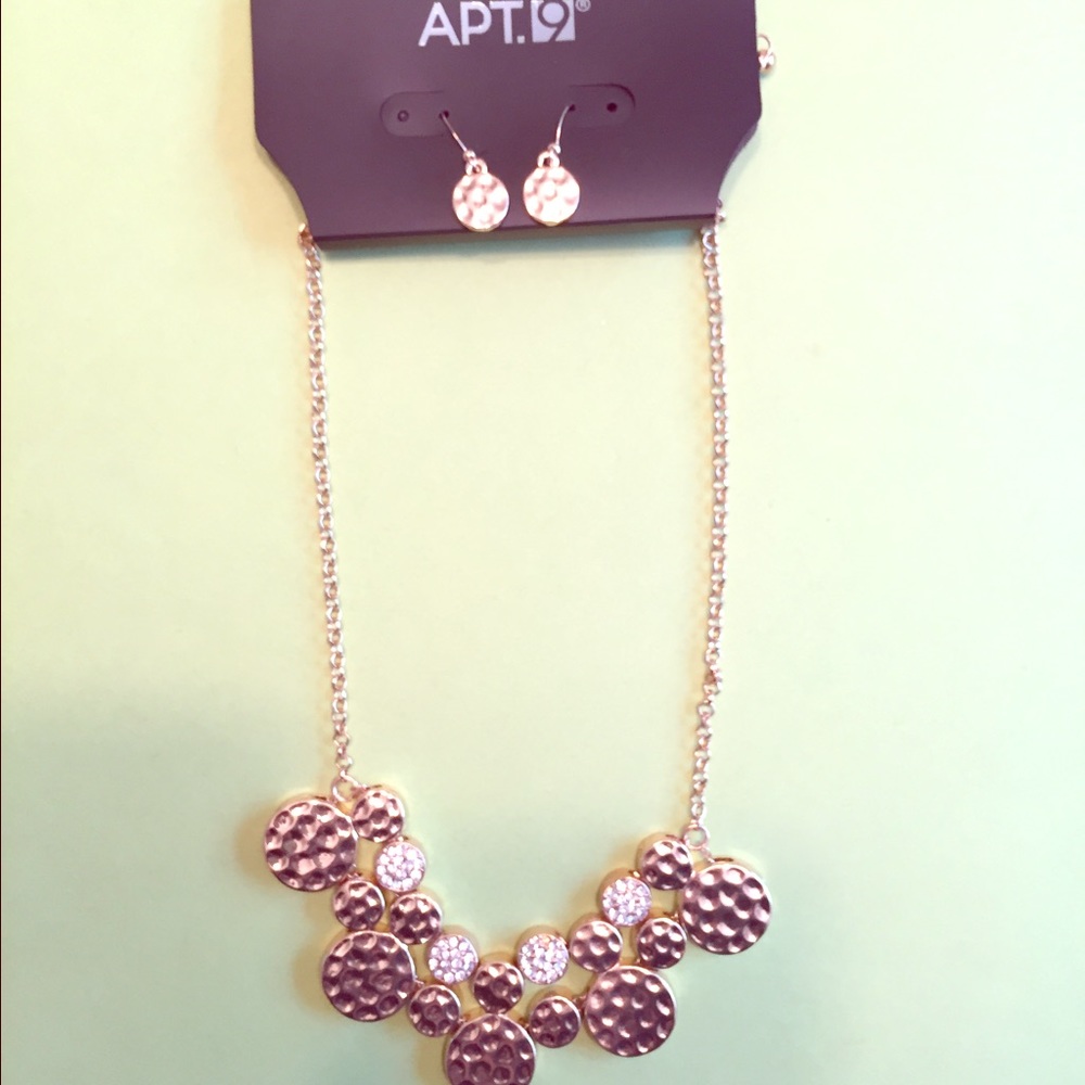 Matching gold earring and necklace set