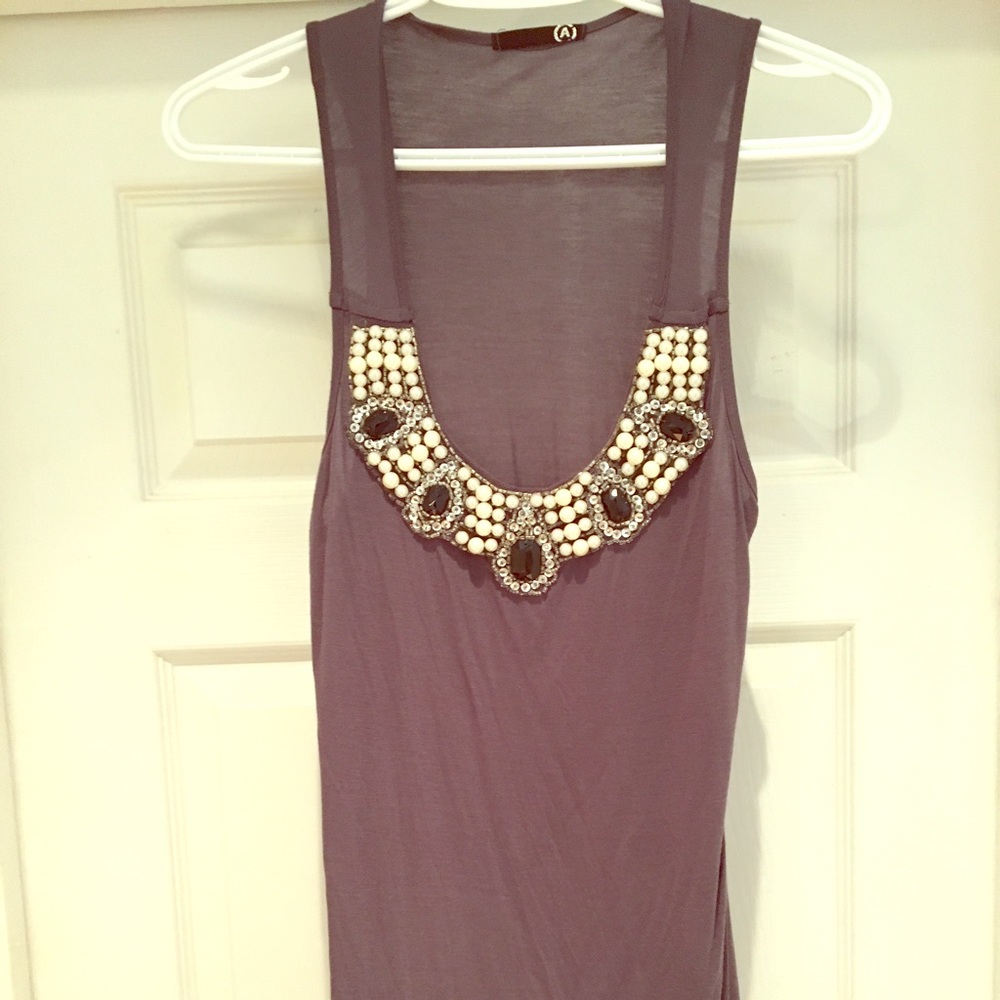 Beautiful blouse with neck detail. Nwot.