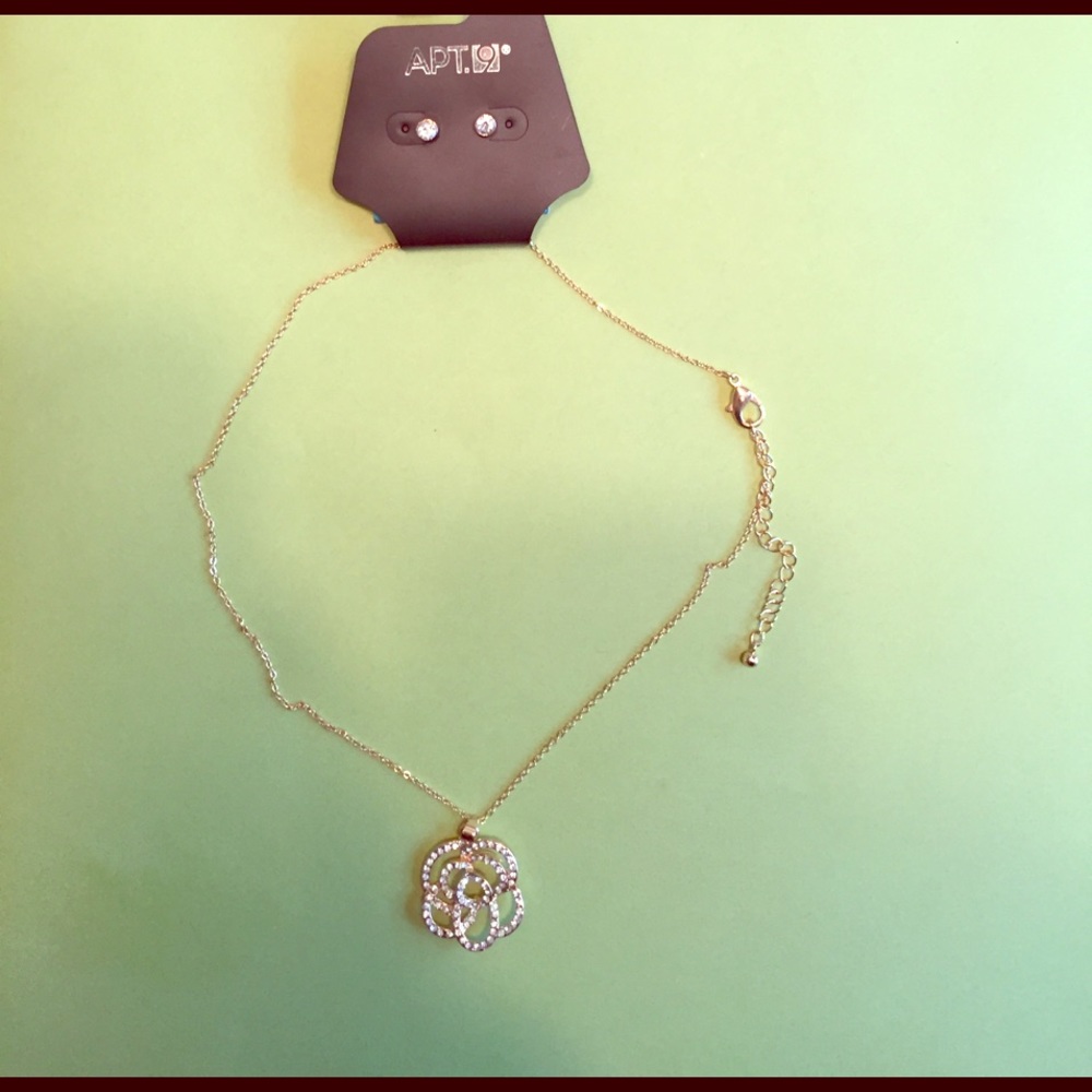 Studded earring and rose necklace