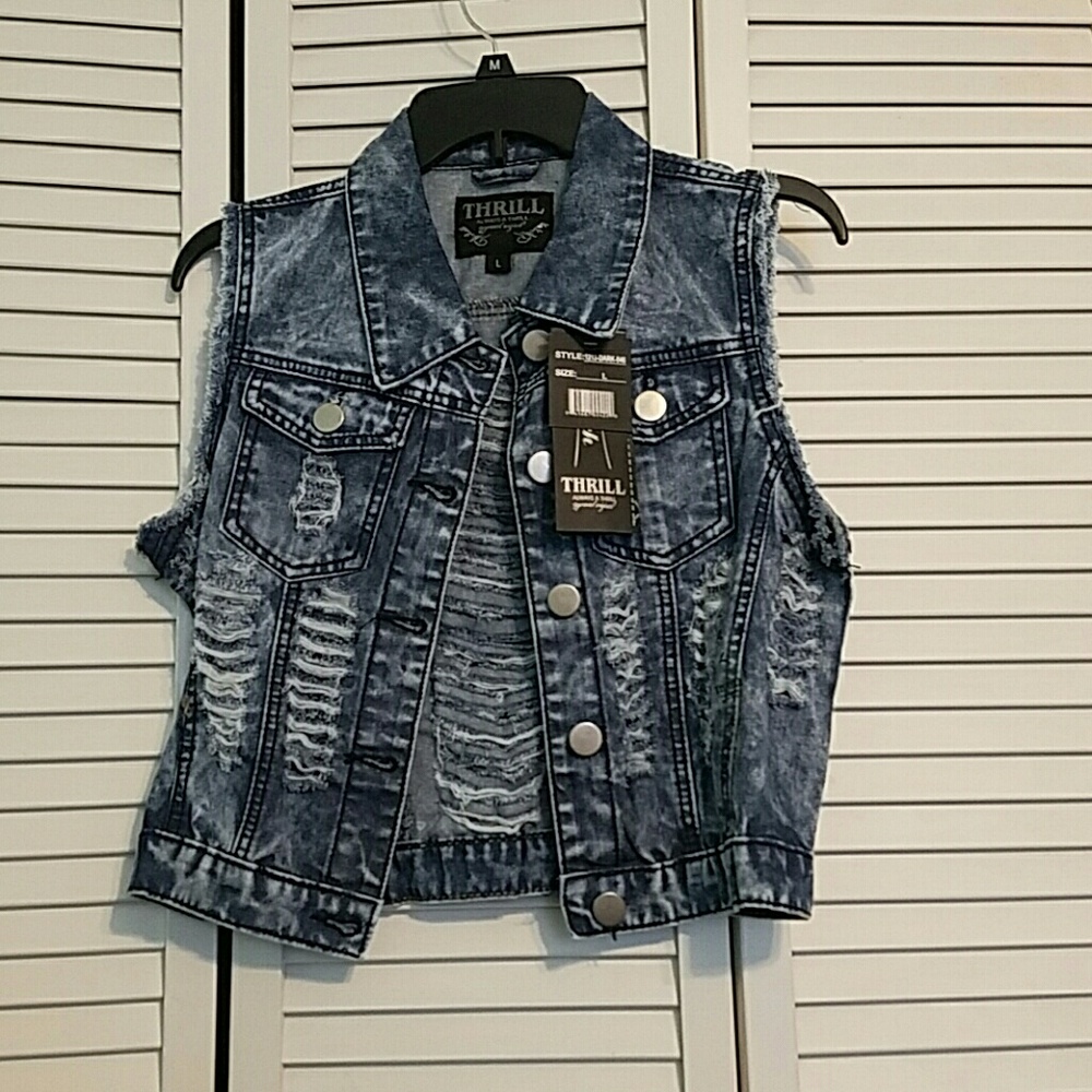 Sleeveless distressed jean jacket