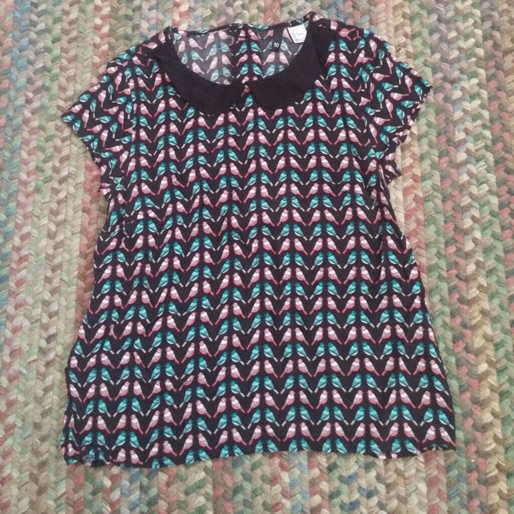 10 blue and pink patterned bird top