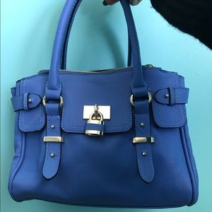 Blue buckled purse