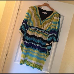 Mini dress with cold shoulder "wing" sleeves